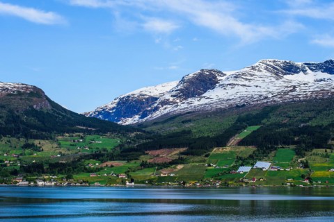 Mountains and Fjord over Norwegian Village, Olden, Innvikfjorden, Norway, Europe