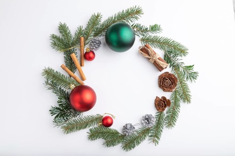 Christmas or New Year wreath composition. Decorations, balls, cones, fir and spruce branches, on