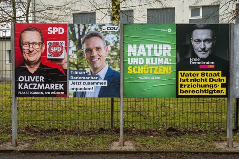 Board with election posters, SPD, CDU, Bündnis90 Die Grünen, FDP, Bundestag election 2025, Kamen,