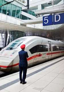ICE at the centre platform with Deutsche Bahn staff, long-distance train station, airport,