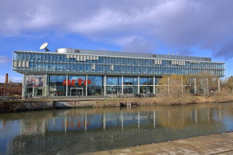Modern building of the broadcasting station Arte of ARD and ZDF at the river Ill, bank, satellite