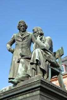 Brothers Grimm national monument, standing Jacob and sitting on the chair Wilhelm, brothers, bronze