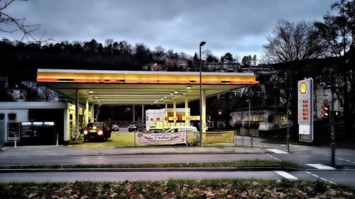 Petrol station Shell night light clouds sky dark evening atmosphere colours Stuttgart,