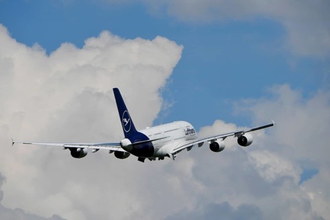 Lufthansa Airbus A380-800 taking off with blue sky and clouds, runway, Munich Airport, Upper