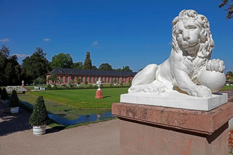 One of four lion statues by Peter Anton von Verschaffelt at the ends of the Querallee between the