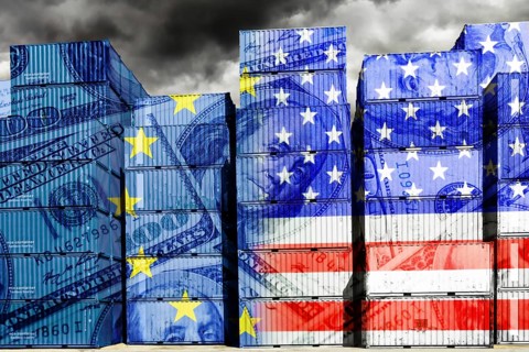 Stacked containers with European and US flags and dollar notes, symbolic photo trade between the