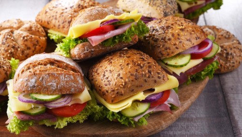 Ham and cheese sandwiches on the kitchen table