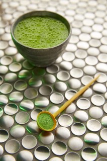 Matcha green tea from Japan on modern stainless steel background