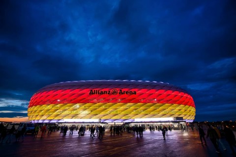 Night shot, stadium, illuminated, illuminated, in German national colours, black-red-gold, UEFA