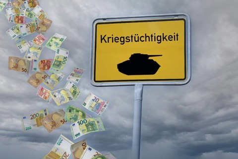 (Photomontage) Town entrance sign with a tank and the inscription KRIEGSTÜCHTIGKEIT against a