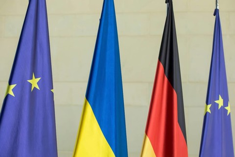 Flags of the European Union (EU), Ukraine and the Federal Republic of Germany in front of the joint