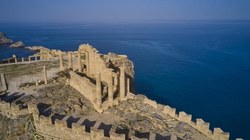 Drone shot, Acropolis of Lindos, late afternoon light, Temple of Athena Lindia, Ruins of an ancient