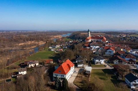 Drone shot, view of the village with Augustinian monastery Reichersberg, Reichersberg, Innviertel.