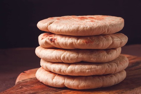 Pita bread, stack, on the table, no people