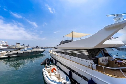 France, French Riviera, Monte Carlo marina with luxury yachts and cars in Monaco bay, Europe