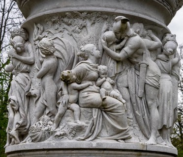 Detail photo, figures and sculptures at the base of the Queen Louise Monument, in the Großer