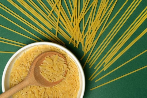 Semi di orzo in shell, pasta variety in the form of cereal grains and spaghetti