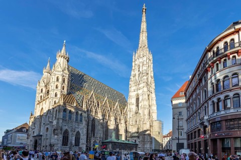 Side view of St Stephen's Cathedral in Vienna with many people in the foreground, Vienna