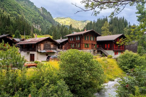 Traditional wooden houses in the mountain village of Fionnay, Val de Bagnes, Valais, Western Alps,