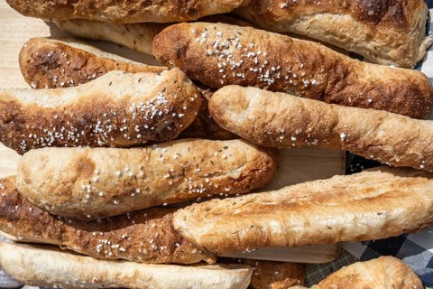 Freshly baked bread, breadsticks, souls with salt and caraway seeds, traditional pastries from