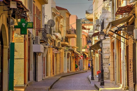 Venetian old town, old town alley almost deserted, colourful houses, cobbled alleyway, morning