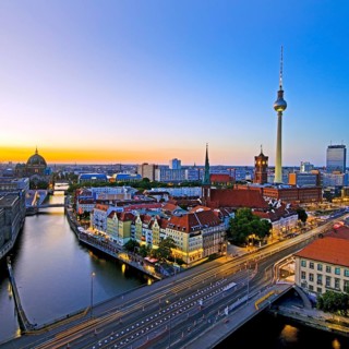 City panorama with Spree, Cathedral, Nikolai Quarter, Red City Hall and TV Tower in the evening,