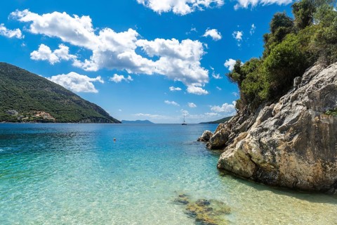 Beautiful beach in summer of Paralia Mikros Gialos in the south of the island of Lefkada. Greece