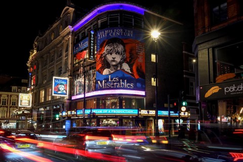 Traffic at night outside the Sondheim Theatre, Les Misérables, Musical, West End, London, England,