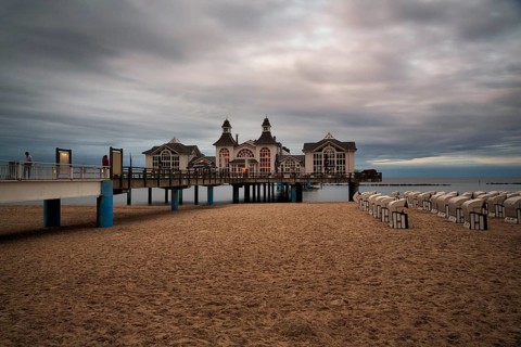 Pedestrians on the Sellin pier at dusk, long exposure, Baltic resort Sellin, Rügen Island,