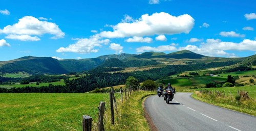 Motorcycle group in Sancy Massif. Auvergne Volcanoes Natural Park. Puy de Dome department. Auvergne