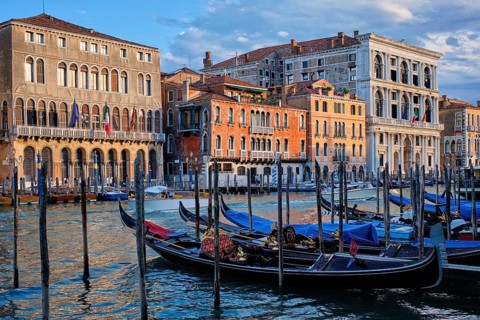 Grand Canal with boats and gondolas on sunset, Venice, Italy, Europe