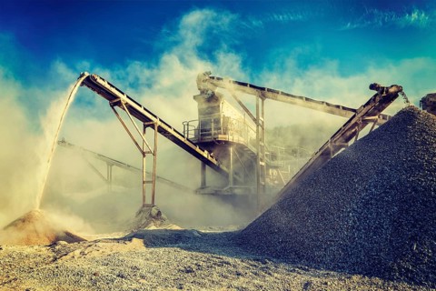 Vintage retro effect filtered hipster style image of Industrial background, crusher rock stone