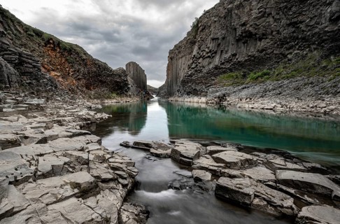 Stuðlagil Canyon, turquoise river between basalt columns, Egilsstadir, Iceland, Europe