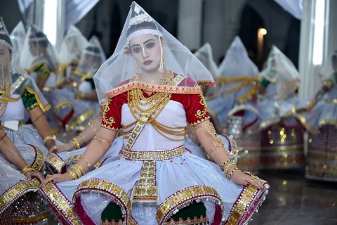 Artistes enacting the role of Gopi as they perform Manipuri Raas Leela Dance in Imphal, Manipur,