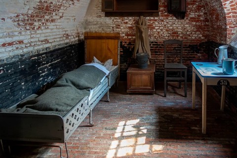 Interior of old jail cell at the prison museum at Merksplas near Hoogstraten, province of Antwerp,