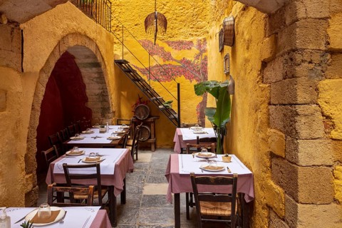 Greece, Chania Island restaurants and cafes. Traditional Greek food in historic center, Europe