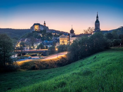 Town view with Upper Castle, Lower Castle and St Mary's Church at dusk, Greiz, Thuringia, Germany,