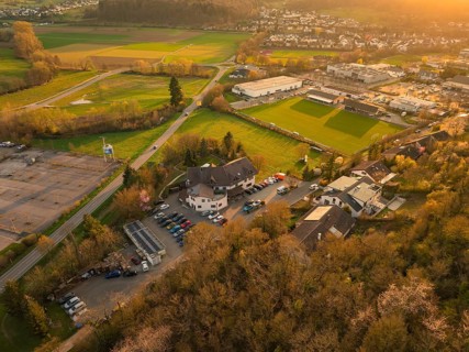 Panorama of a rural cityscape at sunset with extensive fields, Europäischer Hof, Königsbach,