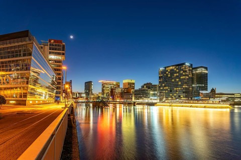Modern high-rise architecture in the Media Harbour quarter in Düsseldorf at dusk, North