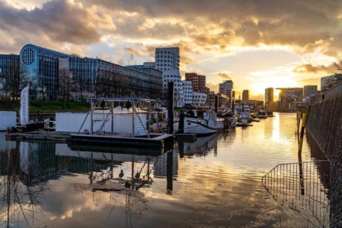Gehry buildings - Neuer Zollhof at the Media Harbour in Düsseldorf at sunset, North