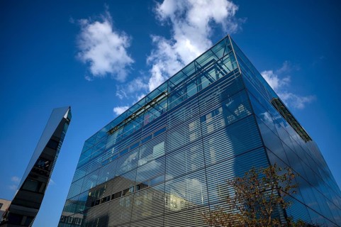 Sculpture made of glass and polylite by Carsten Nicolai behind art museum, Cube, Spiegelung,