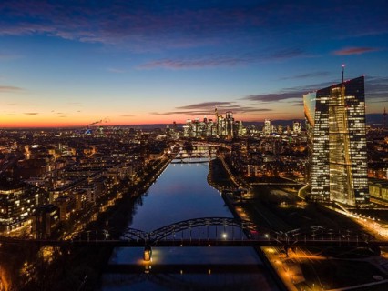 The lights in the offices of the European Central Bank (ECB) and in the skyscrapers of Frankfurt's