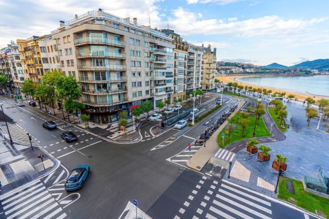 Aerial view of the avenue and the beach of La Concha without people in Donostia San Sebastian,