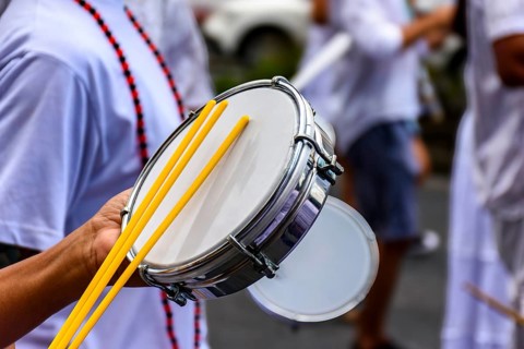 Tambourine player on the streets of Brazil during Carnival, Brazil, South America