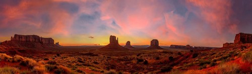 Panoramic in Monument Valley National Park at orange sunrise, Utah. United States