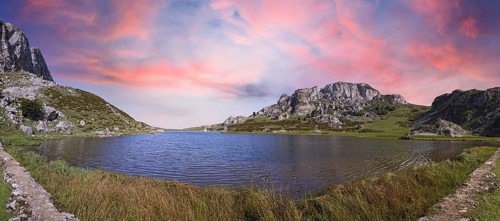 Panoramic of the beautiful lake of Covadonga in Asturias, a beautiful spring sunset, Picos de