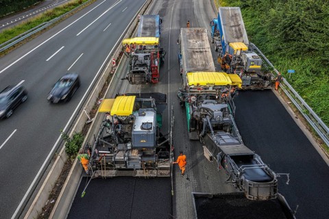 Essen, North Rhine-Westphalia, Germany, Road construction, Asphalt pavers and road rollers lay new,