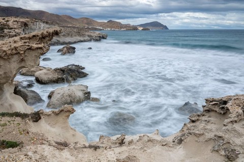 Waves on rocky coast, Playa Los Escullos, Cabo de Gata, Los Escullos, Playa del Arco, El Arco