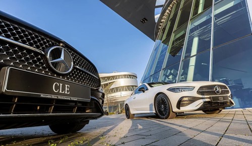 New Mercedes cars at the Stuttgart branch, with the Mercedes Museum behind it. Stuttgart,