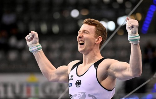 Nils Dunkel GER cheers after routine on rings gymnastics, EnBW DTB-Pokal, Porsche-Arena, Stuttgart,